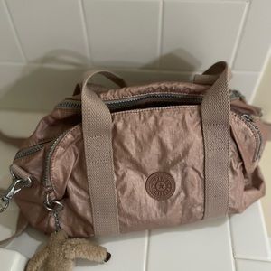 Kipling handbag in rose gold metallic